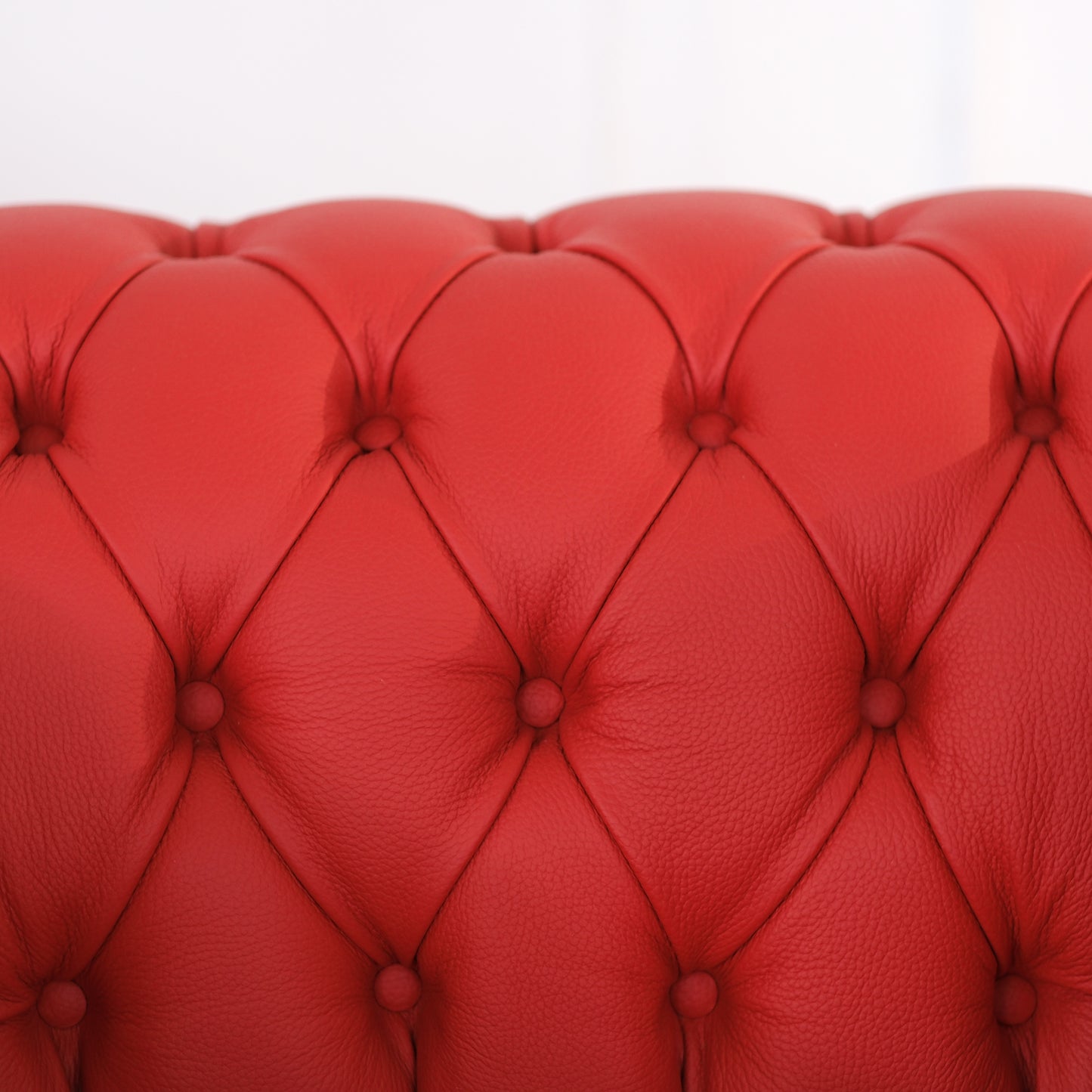 Poltrona Chester pelle fiore rosso Ferrari