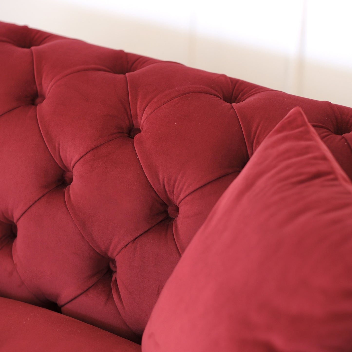 Itaca Sofa dunkelrot Samt Capitonné Stahlfüße silber