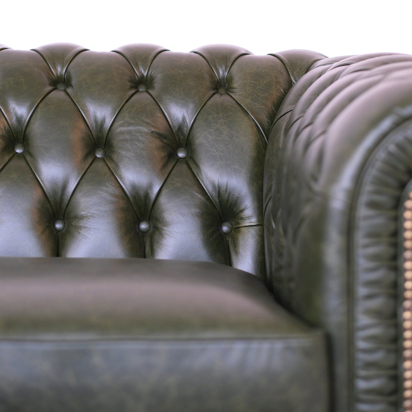 Divano Chesterfield angolare in pelle primo fiore verde inglese borchie anticate